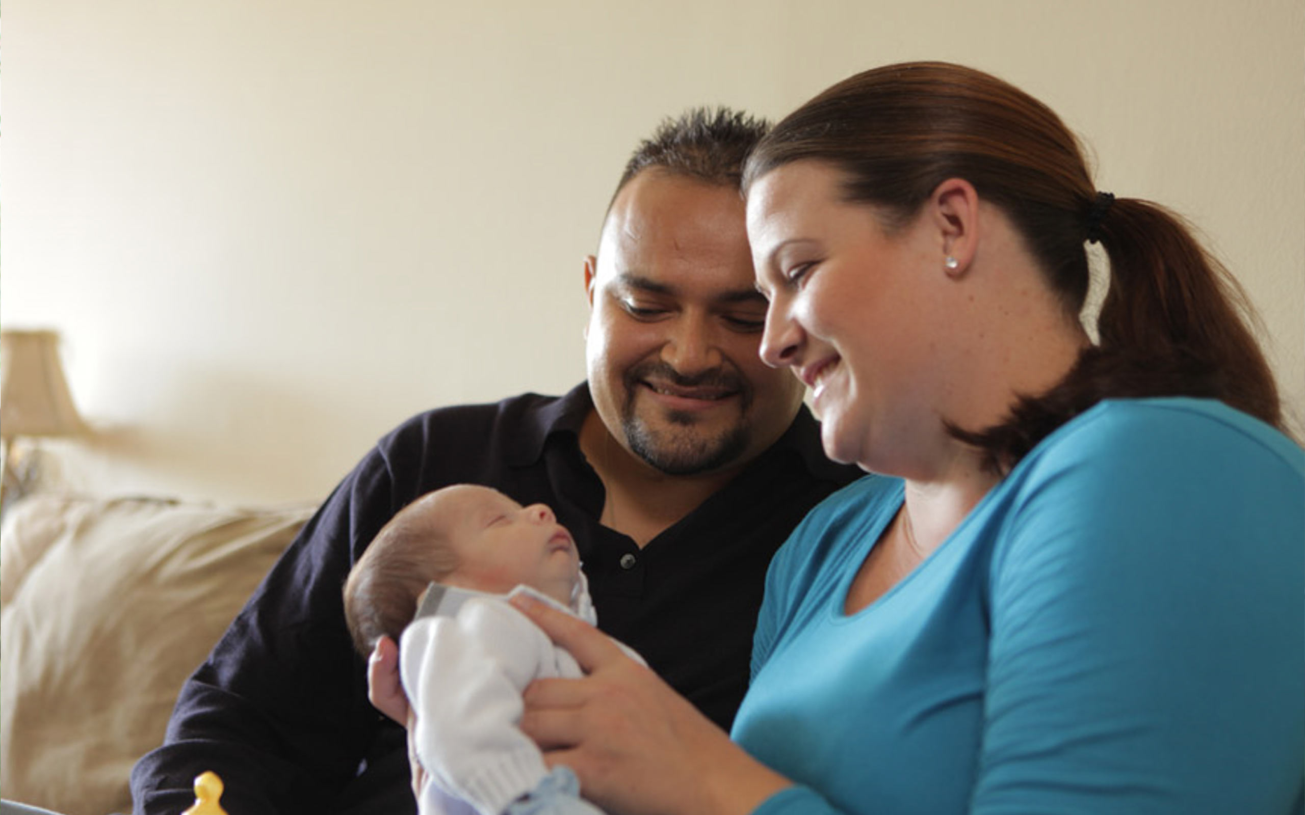 Victor, diagnosed with PNH at 27 years old, with his fiancée and child